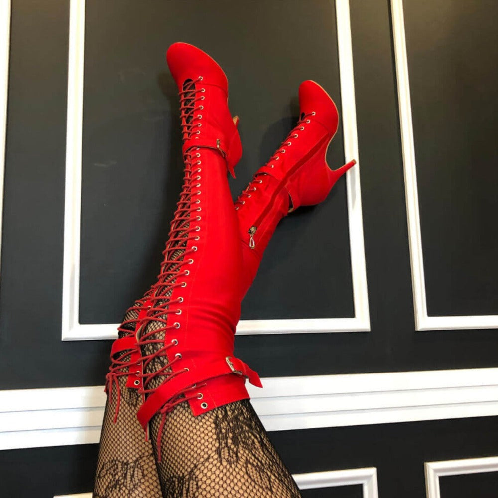 Leilani | Red closed toe lace-up high heel boots with stiletto heels.
