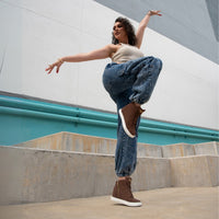Dancer wearing mocha Fuego wedges