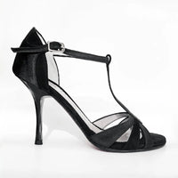 A single black high-heeled dance shoe with a T-strap, ankle strap with a silver buckle, and open toe, shown against a plain white background.
