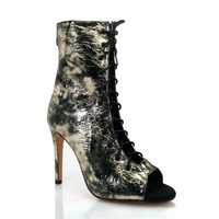 Sofiya Latin dance booties in gold and black with cutout design.