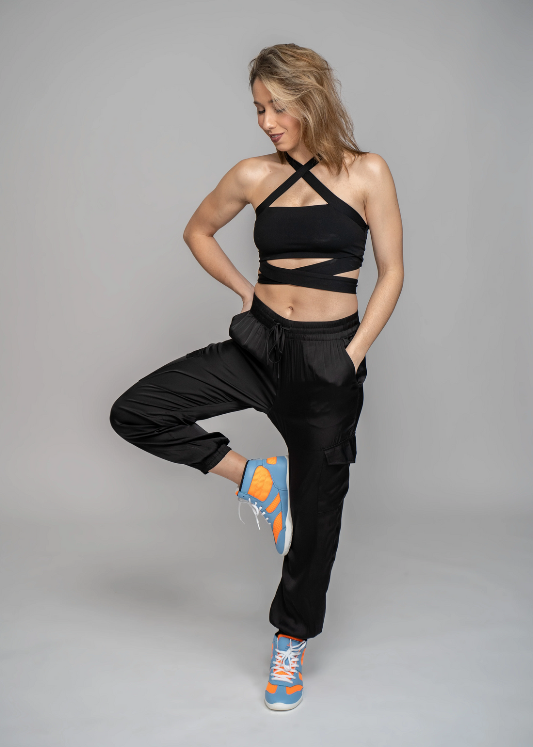 Woman wearing Vigor hi top dance sneaker unisex Blue and Orange Retro