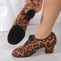 Leopard print shoes with a split sole worn by a person 